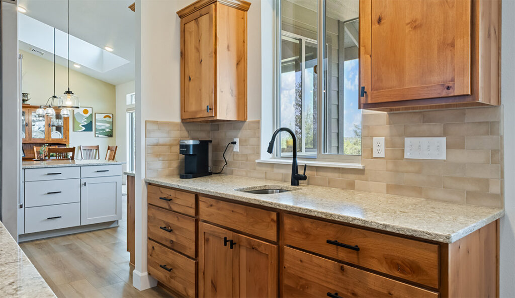 Home Plan 248 butler pantry with sink by window.