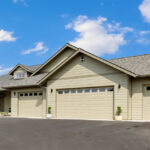 Exterior of Home Plan 2248 with added garage bay.