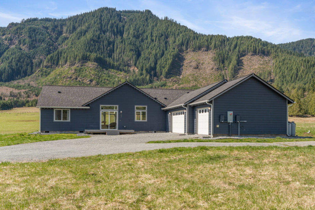 Home Plan 2041 exterior with mountains in background.