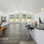 Letting in natural light through the living area windows in Home Plan 2041.