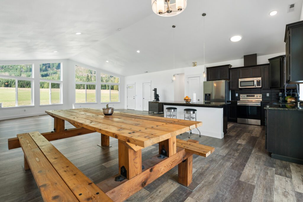 Dining, kitchen, and living area are open concept in Home Plan 2041.