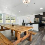 Dining, kitchen, and living area are open concept in Home Plan 2041.