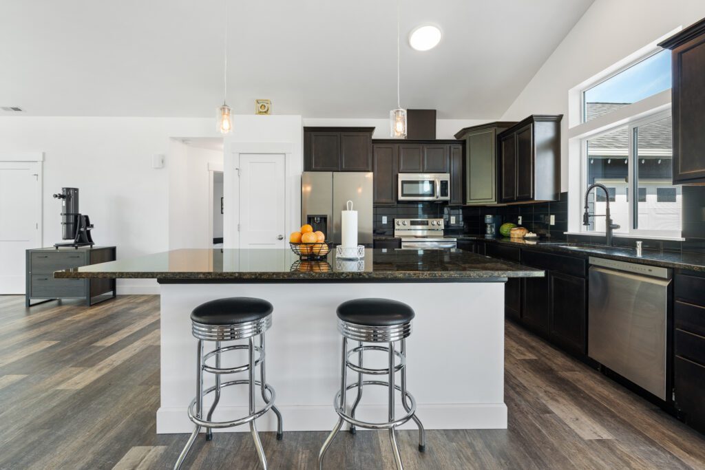 View of island and kitchen in Home Plan 2041.