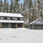 Home Plan 1768 front exterior with detached garage.