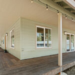 Custom Wrap Around Porch on HiLine Home Plan 1768
