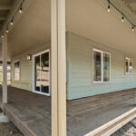 Custom Wrap Around Porch on HiLine Home Plan 1768