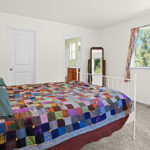 The primary bedroom in home plan 1768.