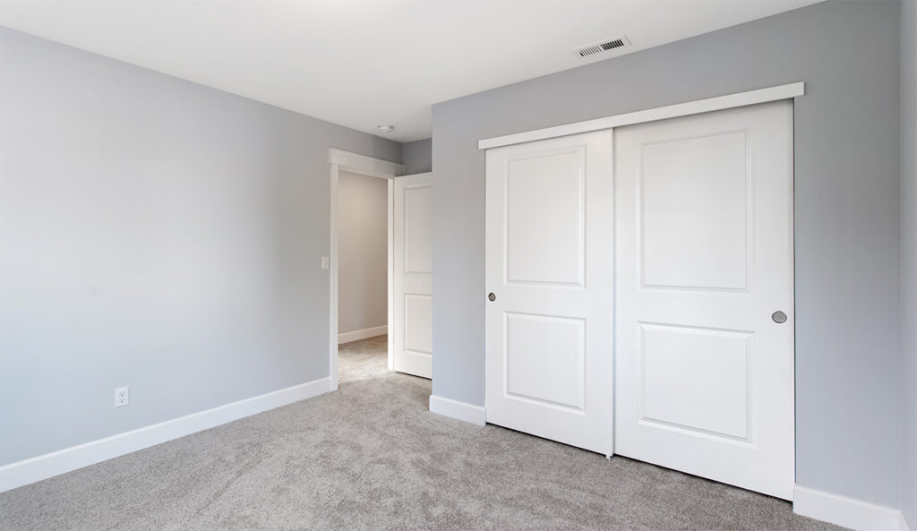Bedroom showing closets.