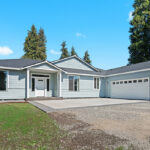 Front exterior of custom home plan 2443.