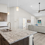 Kitchen into great room of custom home build of home plan 2443.