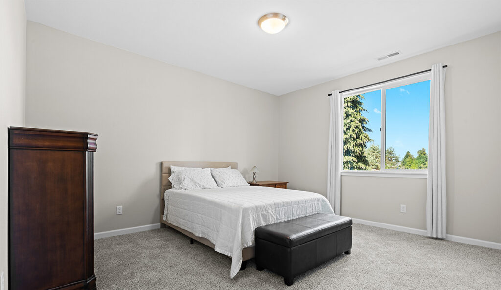 Bedroom 1 in custom home plan 2443.