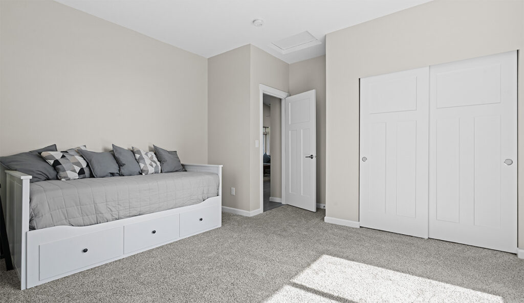 Bedroom 2 in custom home plan 2443.