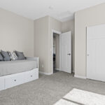 Bedroom 2 in custom home plan 2443.