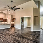 Kitchen and foyer in home plan 2592.