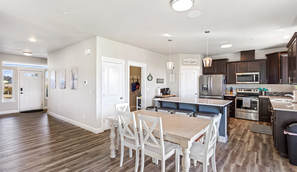 Kitchen and Dining to Foyer in home plan 3072.