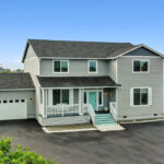 Custom front exterior of home plan 3072.