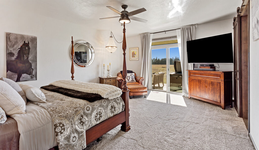 Bedroom with patio access.