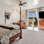 Bedroom with patio access.
