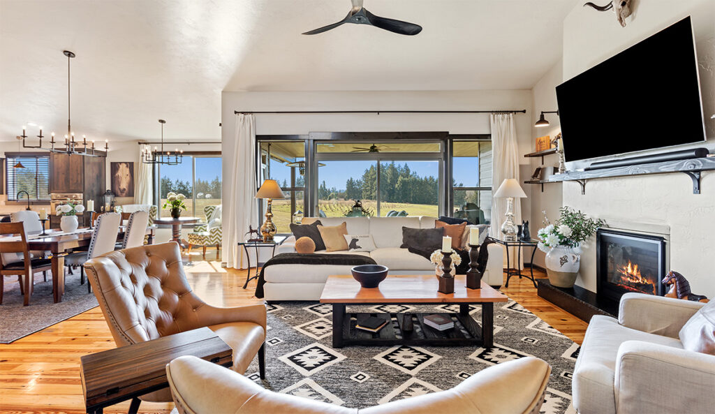 Living room adjacent to dining area.