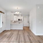 Home Plan 875 living, dining, and kitchen.