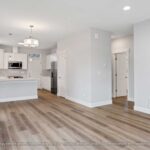 Home Plan 875 living, dining, and kitchen.