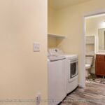 Home Plan 897 laundry and bath.