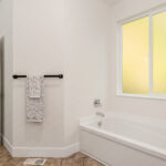 Home Plan 1940A primary bath.