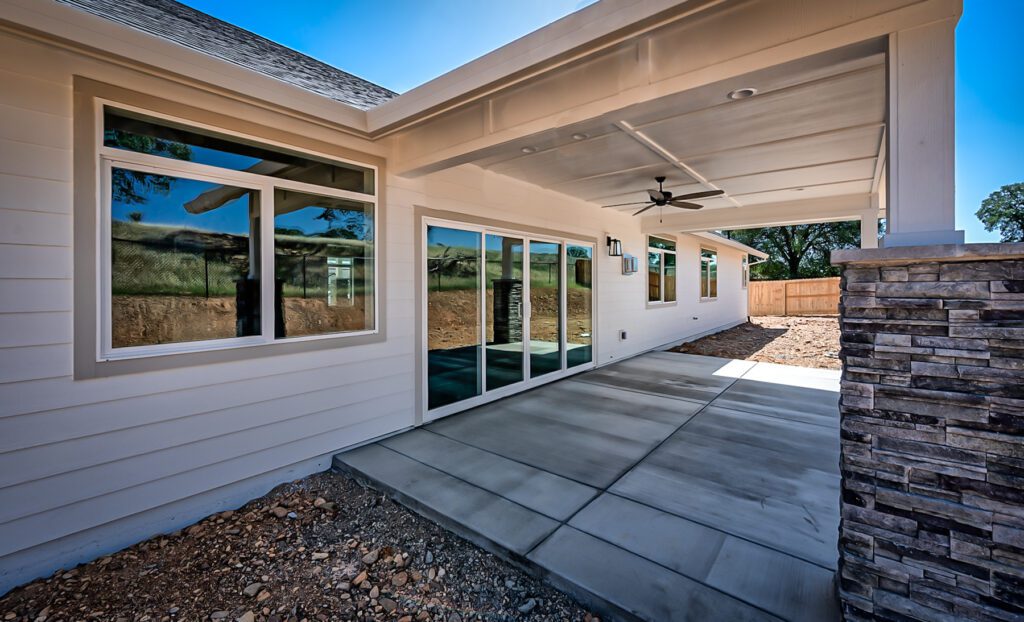 Home Plan 2592 back exterior covered outdoor living space.