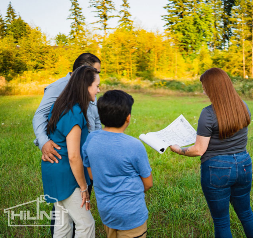 HiLine Homes consultant and family envisioning home on their lot.