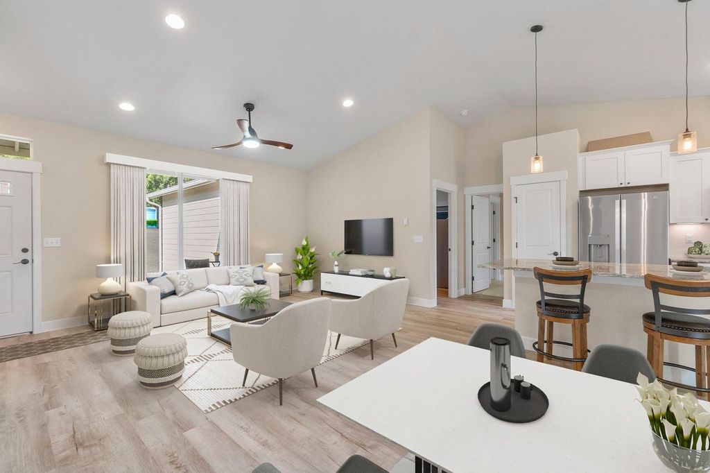 Interior living, dining, and kitchen home build.