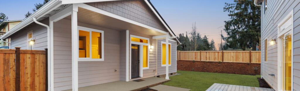 ADU Home Plan 875 front exterior attached to Home Plan 2373.