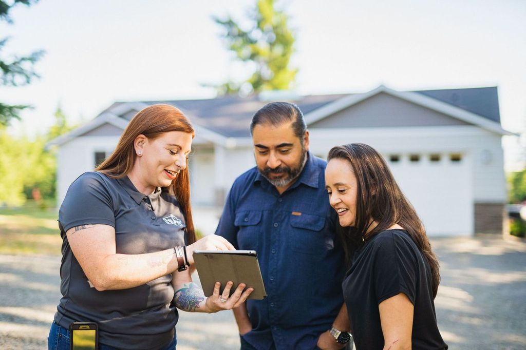 HiLine Homes consultant with homeowner.