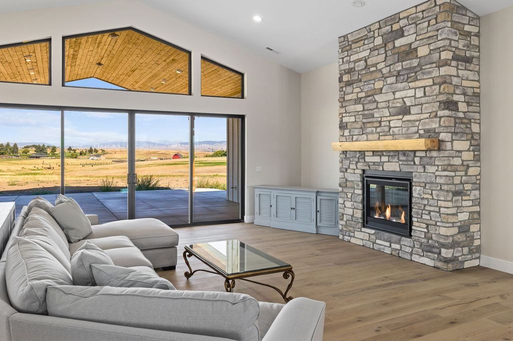 HiLine Homes living with fireplace and custom slider build.