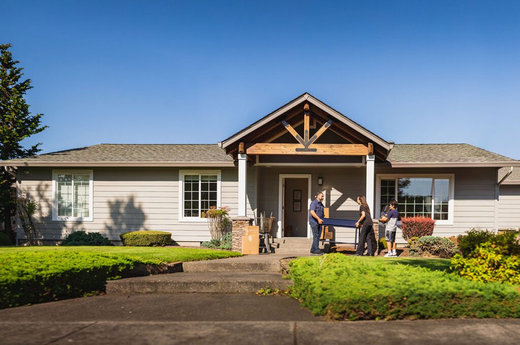 A family moving into a HiLine-built Home.