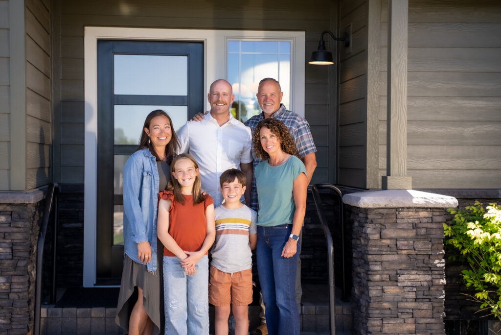 Multigenerational family in front of Redmond home.